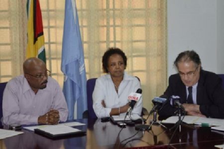 Brazil’s Ambas-sador to Guyana, Luiz Gilberto Seixas de Andrade (right) making brief re-marks as the United Nations Develop-ment Fund, Resi-dent Coordinator for Guyana, Khadija Musa (centre), and the Minister of Local Government and Regional Development Norman Whittaker listen. (GINA photo)