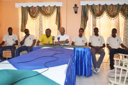 Alpha United officials and players at yesterday’s press conference from left to right- Andrew Murray Jr., Kithson Bain, Coach Wayne Dover, Club President Odinga Lumumba, Gregory Richardson, Ronson Williams and Kirk Duckworth.
