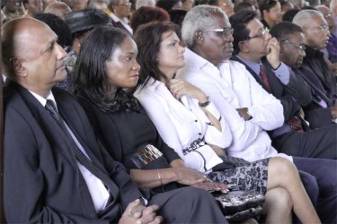 (From left to right) Chancellor of the Judiciary Carl Singh, Minister of Human Services Jennifer Webster,  Mr and Mrs Robeson Benn, Attorney General Anil Nandlall and former PNC leader Robert Corbin at the funeral of  Deborah Backer. 