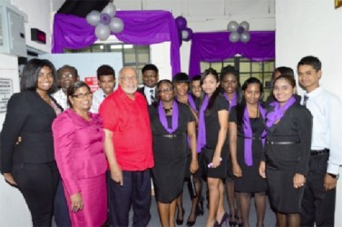 President Donald Ramotar (fifth from left) and staff of Little Rock Radio 88.5FM in New Amsterdam, Berbice (GINA photo) 