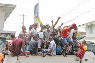 – Let the festivities begin: Arriving by the truckload for Phagwah festivities in Alexander Village today.