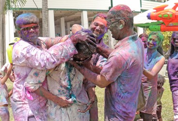 Trapped! Several people ganged up on this man at the Indian Cultural Centre making sure he was well and truly coloured during Monday’s ‘Festival of Colours’.
