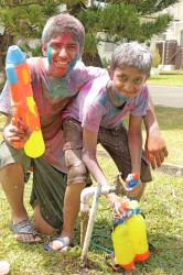 Fully loaded: These youngsters were ready for all-day Phagwah action at the Indian Cultural Centre, Bel Air on Monday.