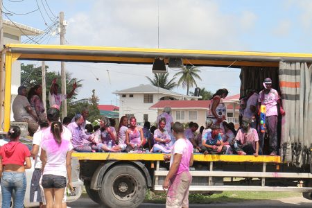 Mobile: This truck carried phagwah revellers through the city on Monday