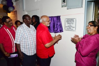 From left: Region Six Chairman David Armogan, Rockcliff Christie, President Donald Ramotar and Pearl Christie unveiling a plaque yesterday commemorating the launch of Little Rock Radio 88.5FM in New Amsterdam, Berbice. (GINA photo)