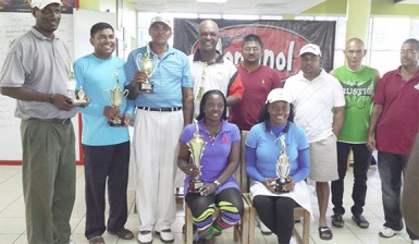 Winners of Torginol golf competition, Shanella Webster sitting at left, Kemraj Dhanraj fifth from left representing Torginol while Vice President of LGC David Mohamad is sixth from left.