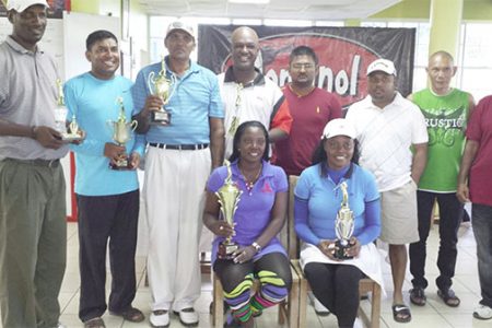 Winners of Torginol golf competition, Shanella Webster sitting at left, Kemraj Dhanraj fifth from left representing Torginol while Vice President of LGC David Mohamad is sixth from left.