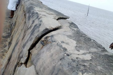 Cracks at the surface of the seawall
