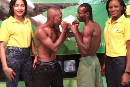 World Boxing Council (WBC) CABOFE flyweight champion, Dexter ‘De Kid’ Marques and Jamaican, Rudolph ‘Cutting Edge’ Hedge square off following the weigh-in last night at the Regency Hotel.