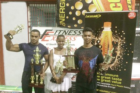 The top lifters of yesterday, Roger Callendar, Andrea Smith and Kevin Briglall posing with their spoils.
