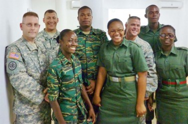 A few members of the GDF pose with members of the Florida National Guard.