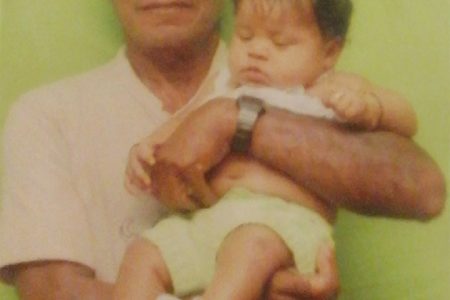 Joao De Souza with his child in happier times