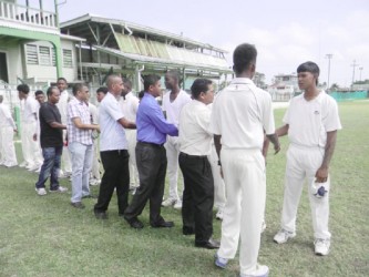 East Coast captain introducing the sponsors and DCB Executives to the players. From right: Rabindra Budhai (DFGI Accountant), Rabindranauth Basil (DFGI Assistant Manager), Anand Sanasie (DCB Vice-President) and Nazimul Drepaul (DCB Chairman of Junior Selector) 