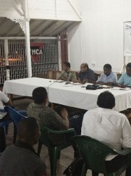  The top brass of the GOA interacting with members of the public and association heads on Friday at the YMCA during the  Public Consultation on “the Way Forward for Sport in Guyana. 