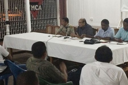  The top brass of the GOA interacting with members of the public and association heads on Friday at the YMCA during the  Public Consultation on “the Way Forward for Sport in Guyana.
