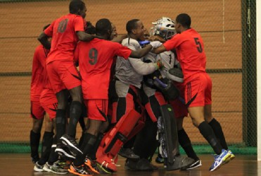 Team Guyana celebrating their bronze medal win over Argentina following the conclusion of the penalty shoot-out 