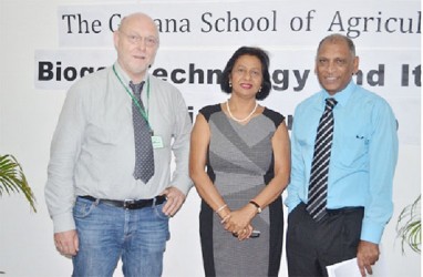 Dr. Leslie Ramsammy, Minister of Agriculture   (right) with Professor Jens Born of Flensburg University of Applied Science of Germany (left) and Dr. Indra Haraksingh, Workshop Coordinator from the Department of Physics, The University of the West Indies. (GINA photo) 