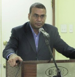   Minister of Natural Resources Robert Persaud 