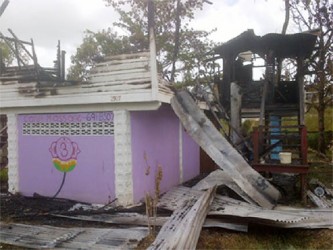 The top flat of the house in North Ruimveldt was ripped apart by the fire