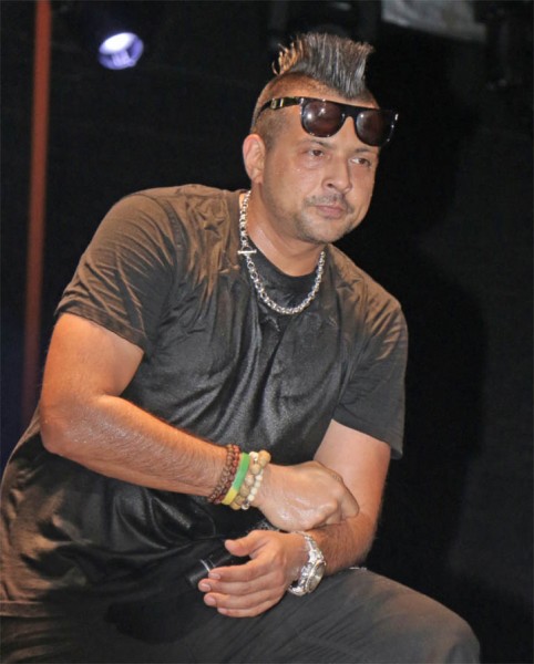 Drenched in sweat! Sean Paul giving it his all at the Easter fest concert at the Guyana National Stadium, Providence on Sunday night. (Photo by Arian Browne)