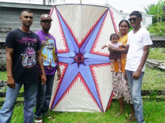 Shazaad Mohood, his wife Reshma and their five-month-old baby along with two friends, Ansar and Nicky pose with the kite before taking sending it up in the air.