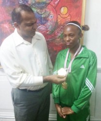 Cassey George during a courtesy call on the Minister of Sport, Dr. Frank Anthony yesterday. 