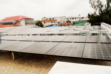 The solar power setup atop Starr Computers complex on Brickdam