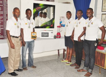 Five members of the Guyana national hockey team which won a bronze medal at the 2014 Pan American Indoor Cup tournament in Uruguay at yesterday’s press conference. (Orlando Charles photo) 