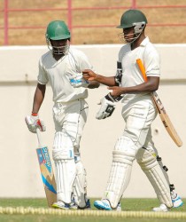 Jermaine Blackwood and Nkrumah Bonner yesterday shared a record second wicket partnership for Jamaica of 180 runs to put their team in a strong position on the opening day of the WICB regional final against the Windward Islands at the Beausejour Ground. Photo by WICB Media/Randy Brooks of Brooks Latouche Photography 