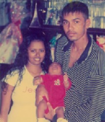 Nandanie Mohan and Vickram Ramdin in happier times with one of their children  