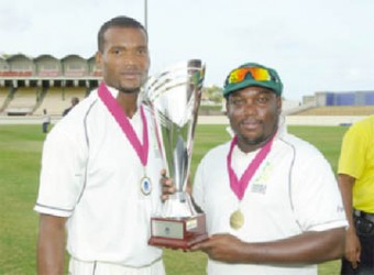 Jamaica skipper Tamar Lambert, right and David Bernard Jnr with the Weekes/Headley Trophy. (Photo courtesy WICB media) 