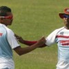 Badree (right) replaces Narine (left) as the number one T20 bowler in the world