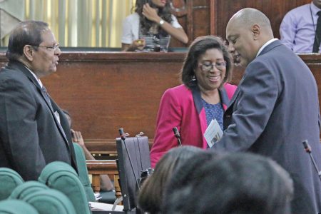 Speaker of the National Assembly, Raphael Trotman (right) in conversation yesterday in Parliament with AFC MPs Cathy Hughes (centre) and Moses Nagamootoo. 