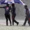 Ground-staff work work assiduously as rain and hail cover the ground at the Shere Bangla Stadium on Thurday. (Photo courtesy WICB Media)