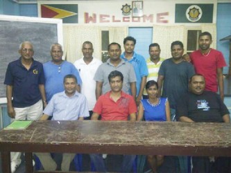 Seated from left to right, Anand Sanasie, Lalta Digamber Sejwattie Ramrattan and Hardeo Oudit. Standing from left to right are Krishnchand Mangal, Robin Khan, Navindra Persaud, Omar Hussein, Reaz Dean, Dhanpaul, Ramesh Persaud and Sudesh Persaud. 