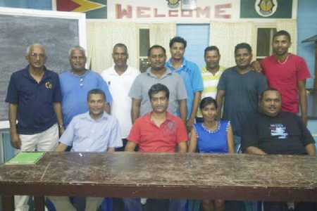 Seated from left to right, Anand Sanasie, Lalta Digamber Sejwattie Ramrattan and Hardeo Oudit. Standing from left to right are Krishnchand Mangal, Robin Khan, Navindra Persaud, Omar Hussein, Reaz Dean, Dhanpaul, Ramesh Persaud and Sudesh Persaud.

