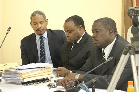  (from left) Andrew Pilgrim, who represents Walter Rodney’s wife and children and Keith Scotland, who represents Donald Rodney sitting at the CoI.