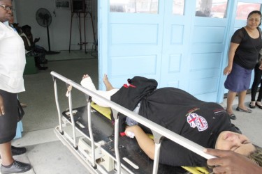 Sandra, a Brazilian woman, is being transported into the emergency unit of the GPH. 