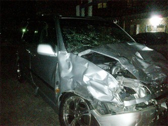 One of the damaged Raums parked at the Grove Police Station after the accident