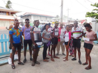 Ray Millington  the sponsors, organizer and other cyclists at the presentation ceremony