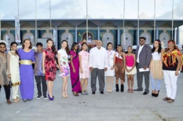 President Donald Ramotar and Minister of Tourism, Industry and Commerce, Irfaan Ali being welcomed by young Guyanese decked out their traditional wear at the launch of the Guyana Festival (GINA photo) 