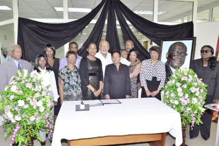 The family of the late Central Bank Governor Lawrence Williams with President Donald Ramotar today at the opening of the book of condolence at the Bank of Guyana. Williams passed away this week. (Government Information Agency photo)
