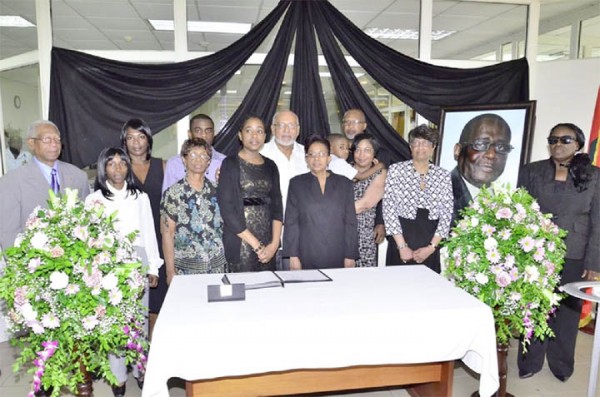 The family of the late Central Bank Governor Lawrence Williams with President Donald Ramotar today at the opening of the book of condolence at the Bank of Guyana. Williams passed away this week. (Government Information Agency photo) 