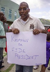 Jamaican chess enthusiast Markland ‘Dougnik’ Douglas demonstrates his preference for the impending FIDE presidential election scheduled to be held in August, in Norway. Two candidates are competing for the prestigious and influential title of president of FIDE - the incumbent Kirsan Ilyumzhinov, and Garry Kasparov. Kasparov visited Jamaica recently as part of his promotional tour of the Americas in preparation for the presidential election. FIDE, the world chess federation, comprises some 160 countries and is second only to FIFA, in terms of affiliated member nations. 