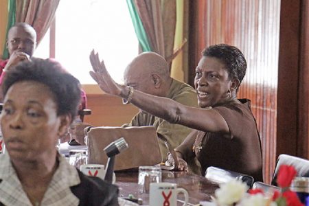 Talk to the hand: PNC Councillor Monica Thomas during the verbal altercation with PPP Councillor Kamla Devi Ross yesterday at City Hall.
