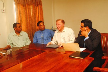 Trade Facilitation Officer Consultant Bertrand Walle with three of the five Canadian businessmen on a buying visit to Guyana