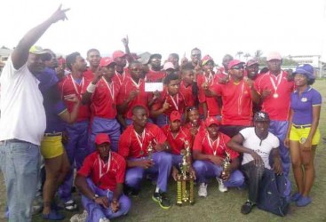 The champions! The Police team with two Carib Beer representatives.