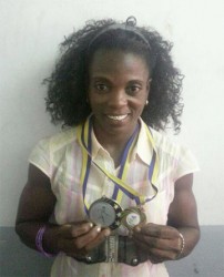 Alisha Fortune and Andrea Foster display their medals. 