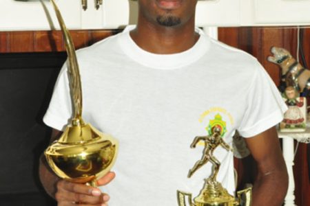 Cleveland Forde with trophies