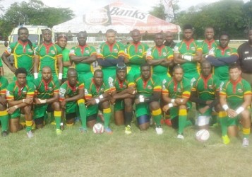 The national 15s rugby squad poses for a picture prior to the game versus Barbados at the Garrison Savannah.  